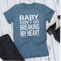 Baby Don't Go Breaking My Heart with white writing